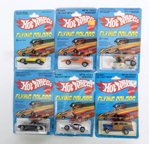 HOTWHEELS: Vintage late 1970s to early 1980s ‘Flying Colors’ including Turbo Mustang (1125) – red: and, ‘Vette Van (1135) – red; and, Airport Rescue (1699) – yellow. All mint and unopened on original cardboard blister packs. (20 items approx.)