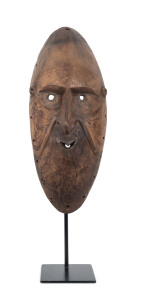 A tribal mask, carved wood, Sepik River region, Papua New Guinea