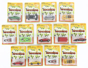 TOMICA: group of model cars 'Series 60' including Ohara Snow Tiger SM30; and, Shiden 77 BMW; and, Lancia Stratos Turbo. All mint in original cardboard packaging with catalogue poster (13 items).