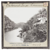 Important collection of glass plate lantern slides with accompanying hand written book of various slide programs. Collection features rare photographs of TASMANIAN ABORIGINES - 12