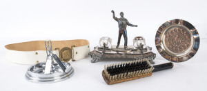 "AUSTRALIAN TEAM REGAINS THE ASHES 1930" commemorative ashtray (bronze & white metal) with 15 portraits of the Australian team; made in Sydney; also, a white metal ashtray featuring crossed bats leaning against a wicket; and, a silver-plated desk inkwell 
