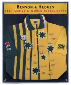 A framed presentation in perspex case, comprising an ACB/World Series team short-sleeved shirt with facsimile signatures of the team; headed "BENSON & HEDGES TEST SERIES & WORLD SERIES 94/95". Overall 75 x 61cm.