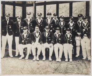 THE AUSTRALIAN TEAM IN ENGLAND, 1930Official team photograph (25 x 30cm) showing the full 15-man touring squad, fully signed in ink by each player (some faded, but all legible) and endorsed in ink on reverse "To Ken with Best Wishes, W.M.W" [William M. Wo