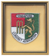 A collection of individually mounted and framed cricket blazer pocket patches including Hong Kong 1963-71, Canada, Malaysia, United States of America Cricket Association, Sri Lanka Cricket, Singapore Cricket Association, Perak Cricket Association, New Zea - 6