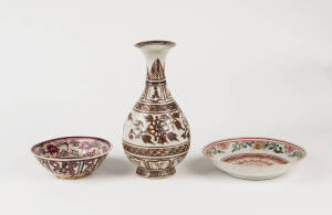 A Ming style iron-red glazed bottle vase, 25cm high, and a Swatow iron red and green bowl 16cm diameter and an iron-red green and gilt saucer dish 20cm diameter