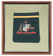 BEN BARNETT'S 1934 AUSTRALIAN TEST TEAM BLAZER POCKET with the Australian Coat of Arms and the date in superb condition. Framed and glazed, overall 29 x 27cm. - 2