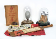 A group of cricket-themed displays and souvenirs.