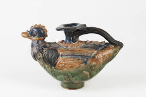 A green blue and brown glazed chicken form vessel, 19cm high