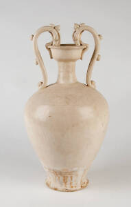 A Tang style cream glaze double handled vase
