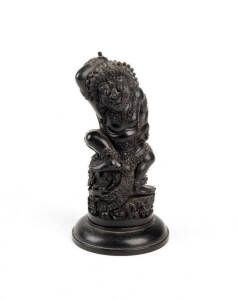 A finely carved hardwood figure of a deity, Indonesian circa 1900