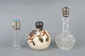 Three assorted perfume bottles with sterling silver mounts, 19th century
