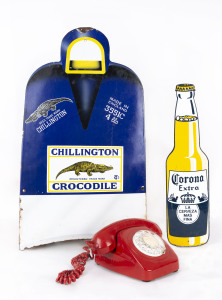 A vintage red plastic telephone, a Corona beer tin sign and a Chillington Crocodile enamel sign, 20th century