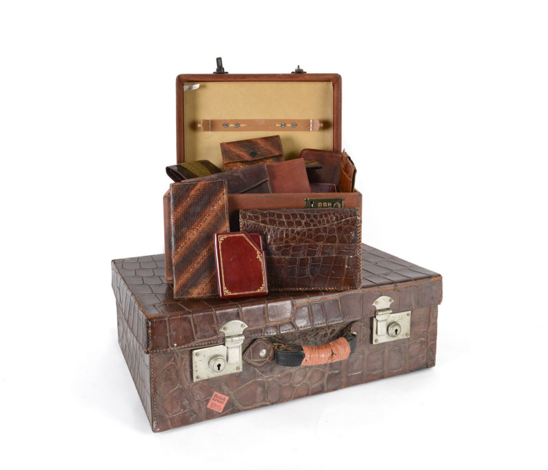 Assorted vintage leather wallets, purses and cases including crocodile skin, snake and lizard skin, 19th and 20th century, (28 items)