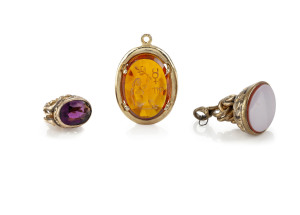 Two watch fob seals and an intaglio carved pendant, pinchbeck and gold plate with semi-precious stones, 19th century