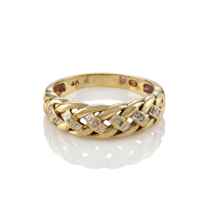 A 9ct gold ring, woven design studded with diamonds