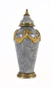 An ornamental mantle urn, hardstone with ormolu mounts, French, 19th century