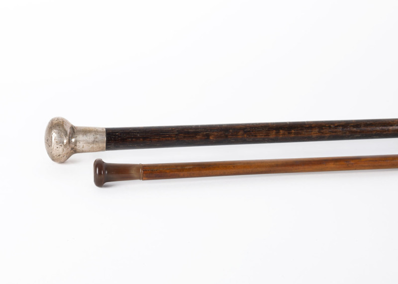 A silver topped walking stick and a swagger stick, 19th/20th century