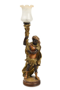 A Blackamoor figural lamp, carved and gilded wood, Italian, early to mid 20th century