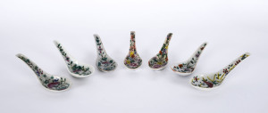 Five China Straits porcelain spoons together with a pair of famille rose porcelain spoons, 19th century