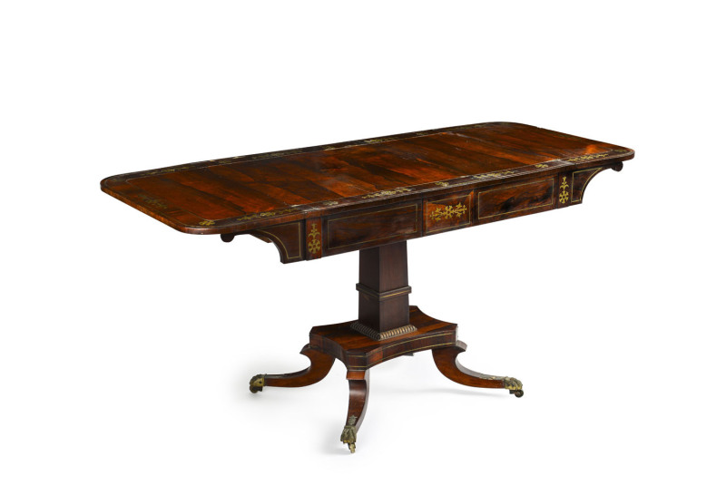 An English Regency sofa table with drop-sides, rosewood with brass inlay, circa 1825