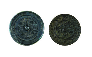 Two Chinese bronze mirrors in the Tang Dynasty and Han Dynasty styles, 19th/20th century