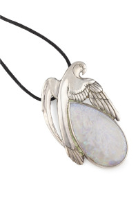 A stunning 56ct Coober Pedy solid white opal pendant set in silver modeled as a parrot, stamped "925" with makers monogram (illegible)