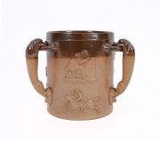 A Doulton Lambeth tig cup with greyhound handles, English, late 19th century