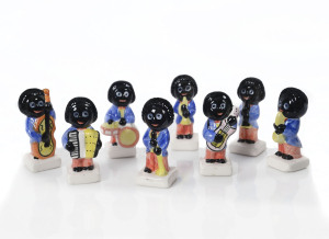 Set of eight Carlton Ware porcelain "Golliwog Band" figures, 20th century