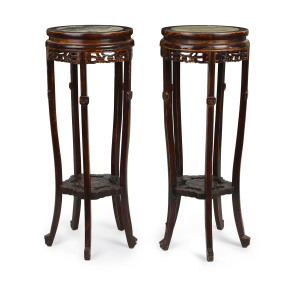 A pair of Chinese carved timber pedestals with marble tops, 20th century