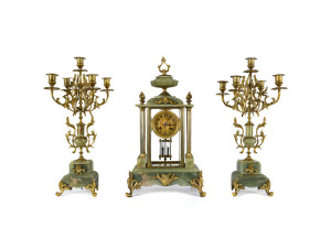 A French crystal regulator in green onyx case with candelabra garniture, 19th century