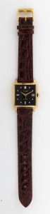 MILUS Automatic gent's watch, 18ct gold case with black dial, movement by Bucherer