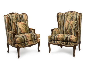 A pair of French carved walnut armchairs, 20th century