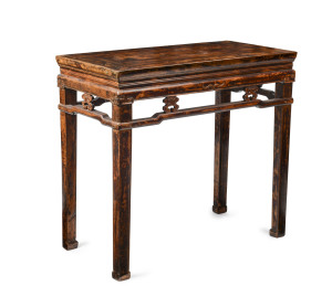 A Chinese temple table, carved timber with remains of lacquered finish, 20th century