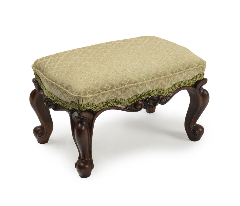 Victorian style footstool by Harvey Brothers, carved walnut with green brocade upholstery, 20th century