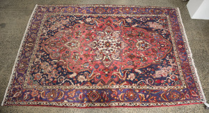 A fine Kaschan red hand-knotted rug, Persia