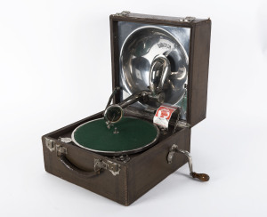 A Decca portable wind up gramophone in brown leather case, early 20th century
