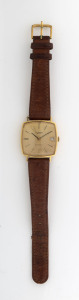 UNIVERSAL Automatic gents calendar wristwatch, 18ct gold case with baton numerals