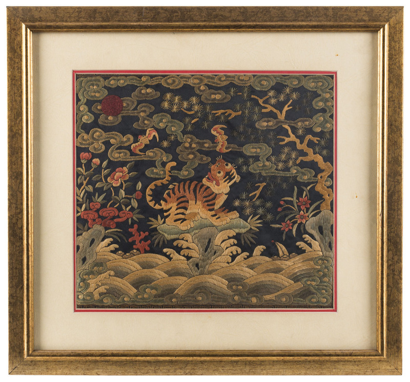 A Chinese embroidered panel of tiger and bats, 19th/20th century