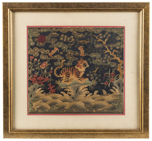 A Chinese embroidered panel of tiger and bats, 19th/20th century