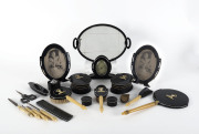 A 20 piece Art Deco bakelite dressing table set, French, circa 1925