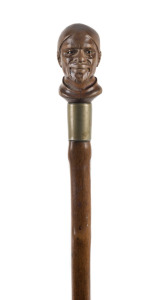 A walking stick with carved Nubian head handle, 19th century