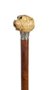 A walking stick with carved ivory bulldog handle and silver collar, 19th century