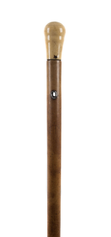 A walking stick, ivory handle with cane shaft, 19th century