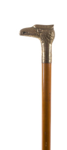 A walking stick, brass eagle head handle and cane shaft, early 20th century