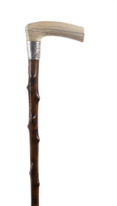 A walking stick, ivory handle with engraved silver collar, 19th century