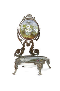 A French pocket watch stand, porcelain and ormolu, 19th century