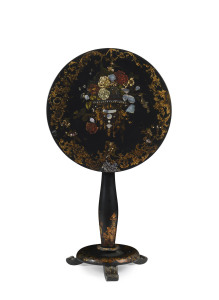 A mother-of-pearl inlaid floral decorated black lacquered table, English, 19th century