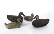 Four decoy ducks, carved timber and painted cork, 20th century