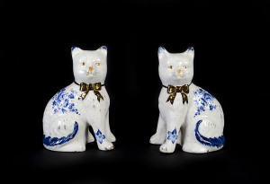 A rare pair of Staffordshire cats, mid 19th century