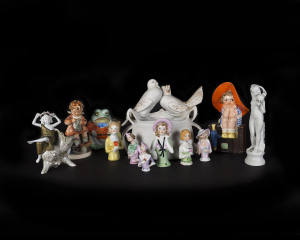 A collection of porcelain piano dolls, bisque ware, Hummel figurine and novelty figures, 19th and 20th century